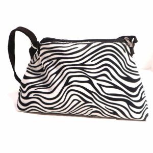 Bolso mano libre zebra blanco y negro